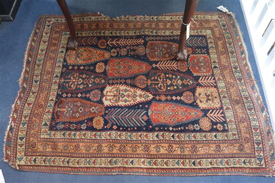 Two red and blue ground rugs, 120 x 90cm & 120 x 100cm